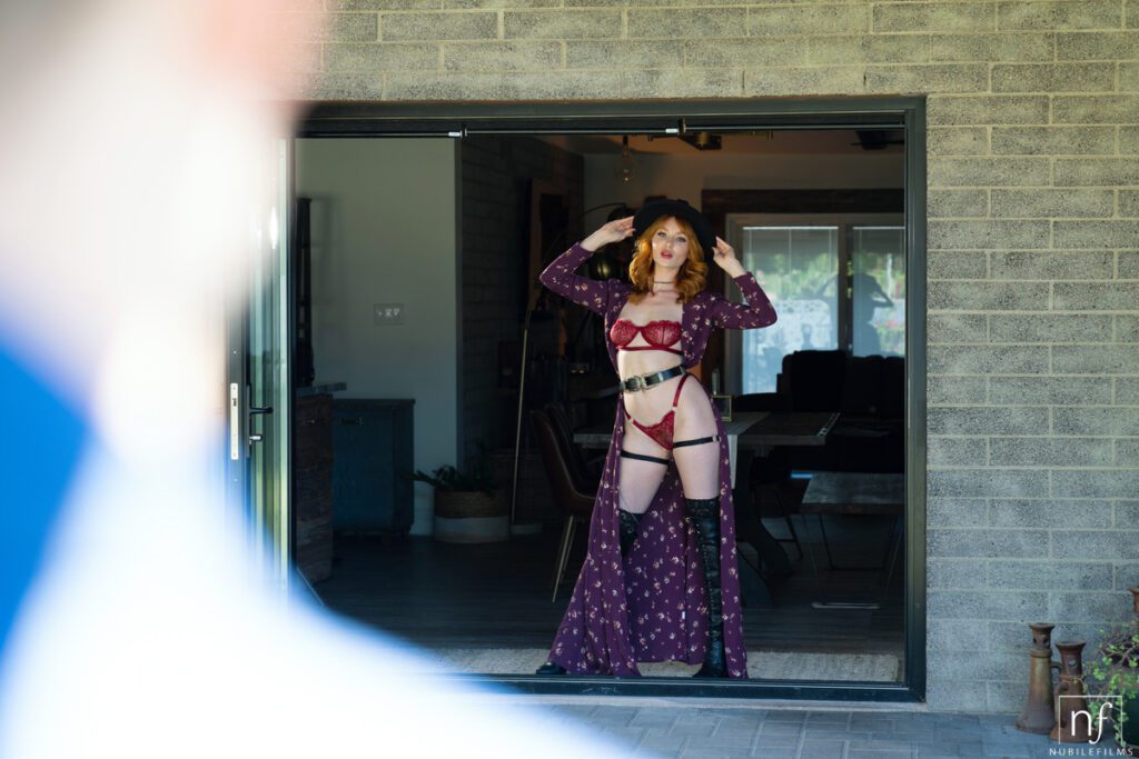 Beautiful ginger girl wears sexy lingerie and knee high boots while fucking